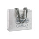 Shopper in tnt laminato effetto glitterato Shopper in tnt laminato effetto glitterato